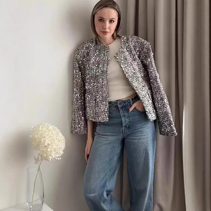 Women's structured bouclé jacket with stand-up collar, patch pockets, and elastic hem Mune Fashion