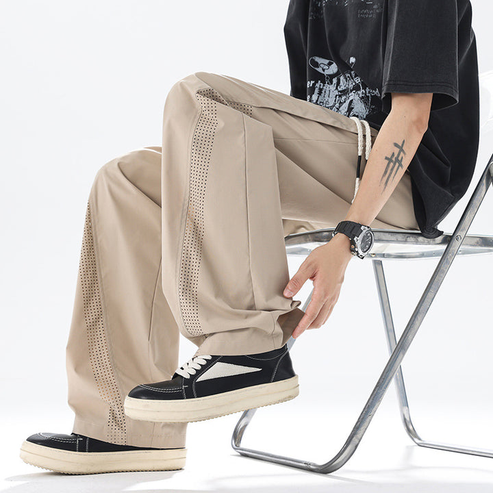 Men's sporty leisure pants with innovative mesh inserts