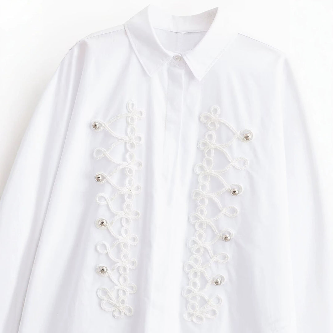 Ladies blouse with decorative frog closures and ornamental cords Mune Fashion
