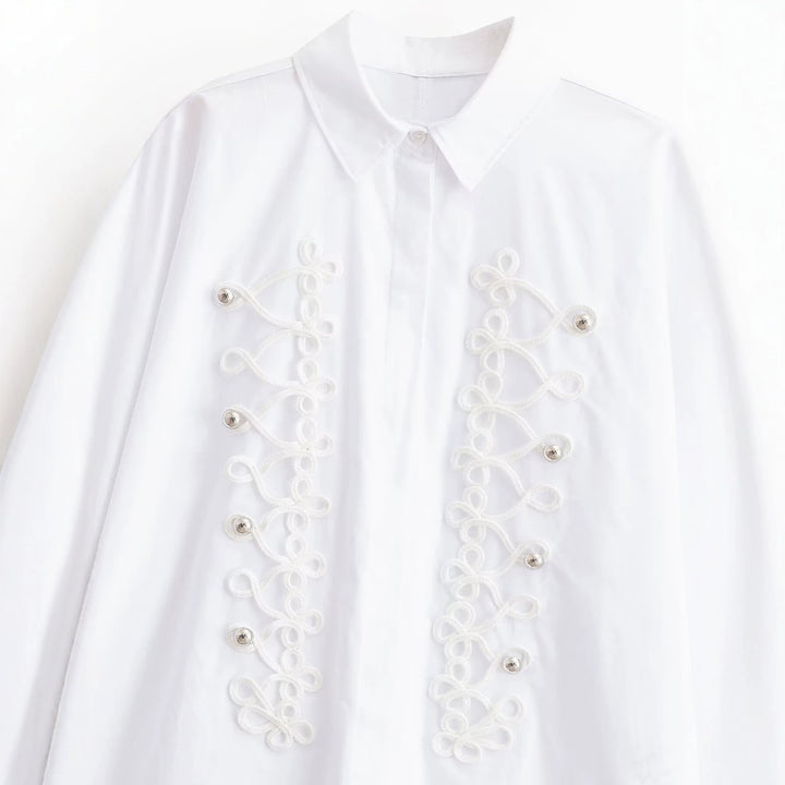Ladies blouse with decorative frog closures and ornamental cords Mune Fashion