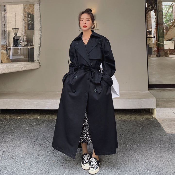 Ladies oversized trench coat with waist belt, double button placket and storm flap Mune Fashion