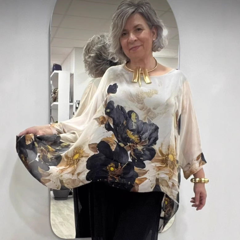 Women's airy chiffon tunic with bat sleeves, asymmetrical hem, and floral print Mune Fashion