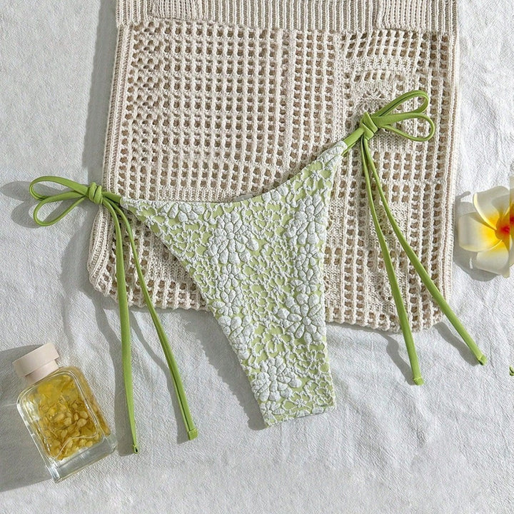 Women's bikini bottom with floral lace applications Mune Fashion