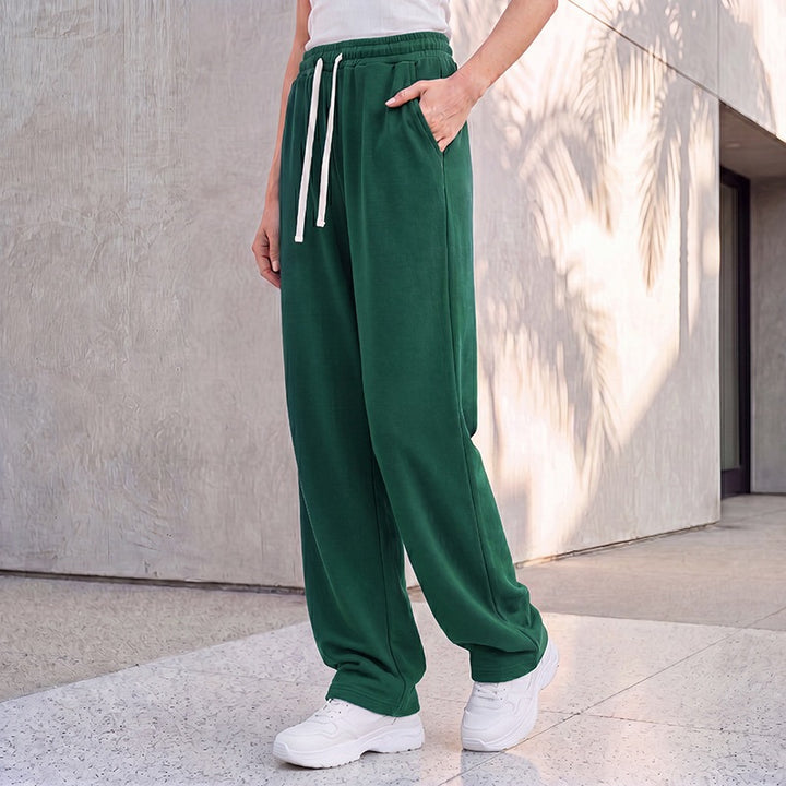 Women's wide lounge palazzo pants with high comfort waistband, drawstring, side pockets, and decorative side seam Mune Fashion