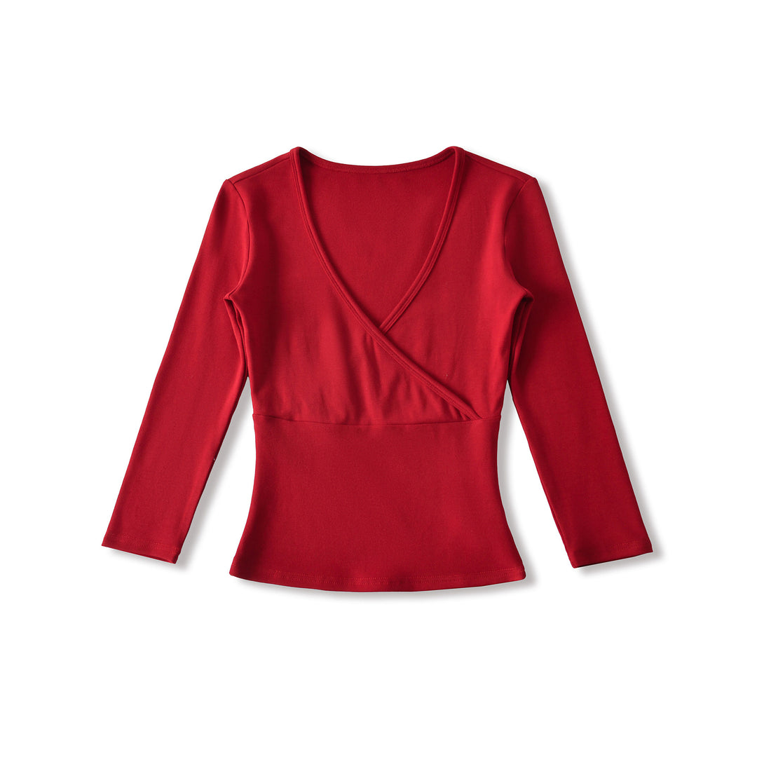 Women's figure-hugging wrap top made of stretch jersey with deep V-neck and tailored silhouette.