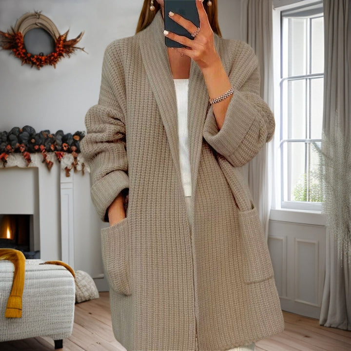 Women's longer oversized knitted coat with shawl collar and patch pockets Mune Fashion