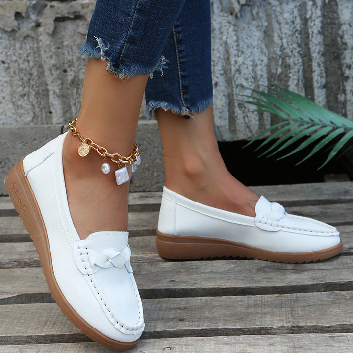 Ladies braided comfort moccasin with contrast stitching, padded memory insole, and flexible rubber profile Mune Fashion