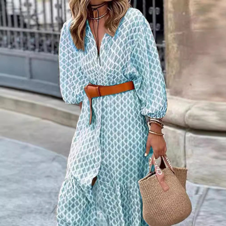 Women's lightweight patterned midi dress with V-neck, button placket, tiered skirt, and balloon sleeves Mune Fashion