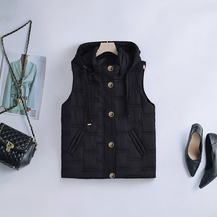 Women's sleeveless quilted hoodie vest with hidden button placket and angled pockets Mune Fashion