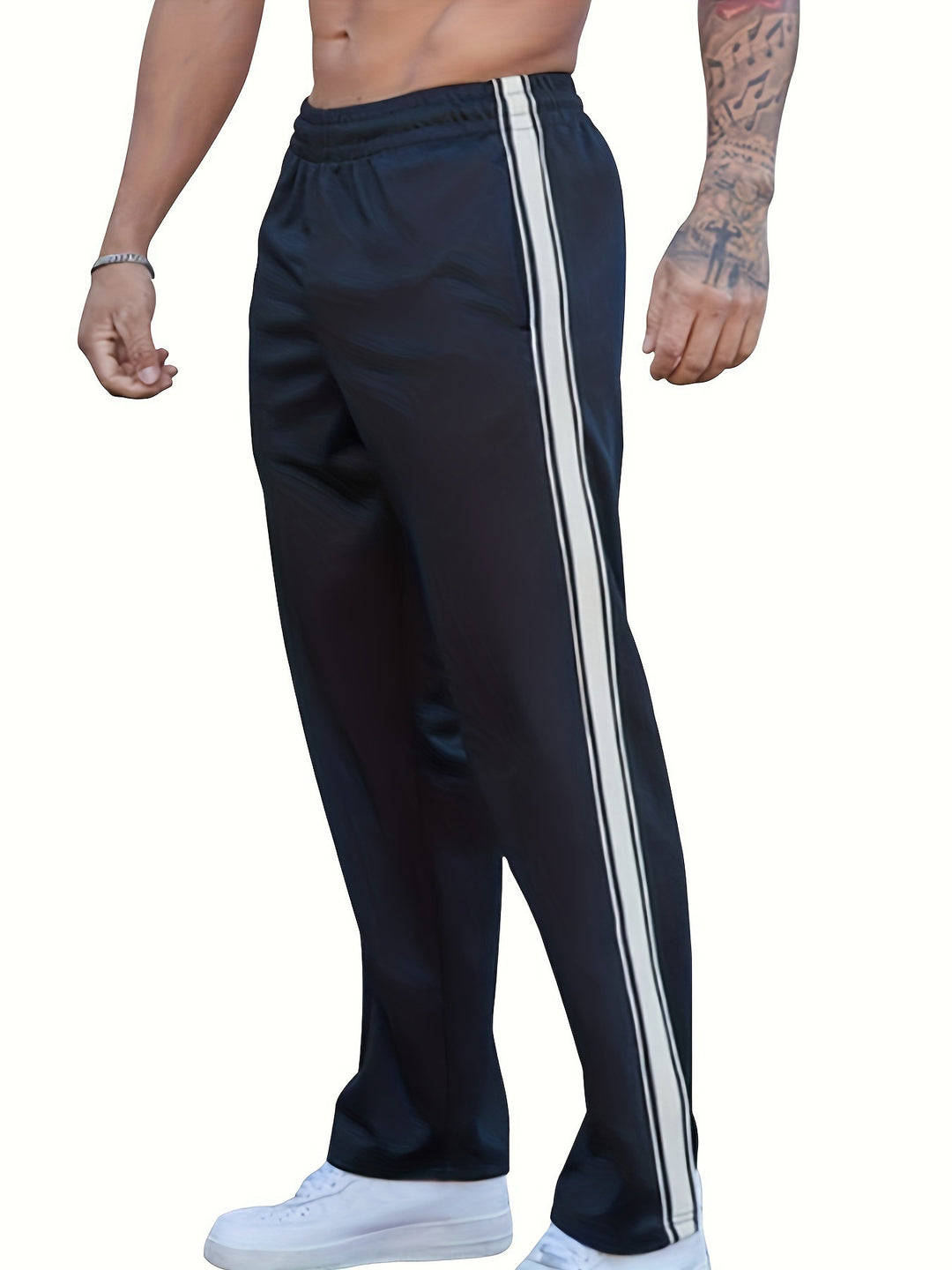 Men's sporty training pants with side tape stripes and elastic waistband Mune Fashion