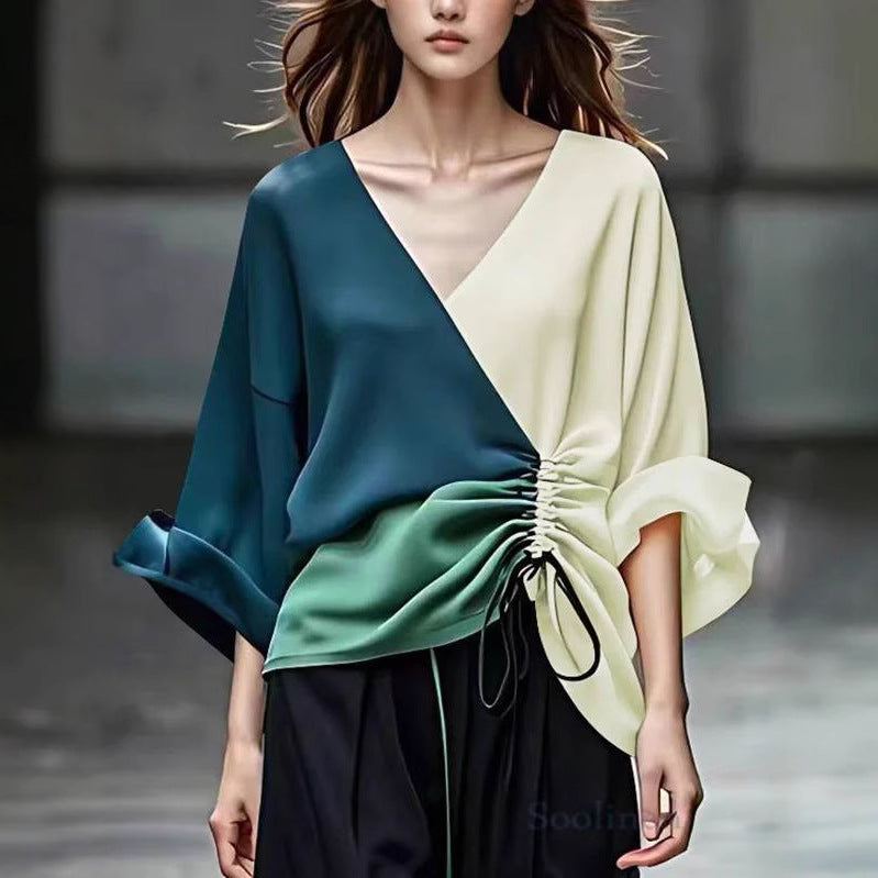Women's blouse with V-neckline and side gathering cord