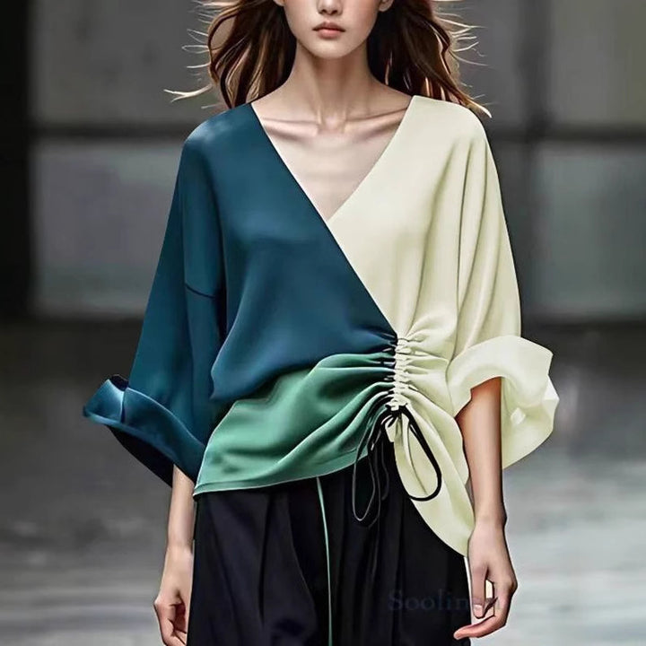 Women's blouse with V-neckline and side gathering cord