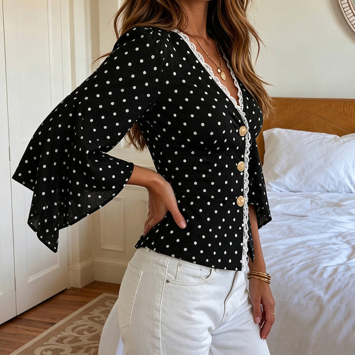 Ladies polka dot blouse with V-neck, lace trim and flared ruffle sleeves Mune Fashion