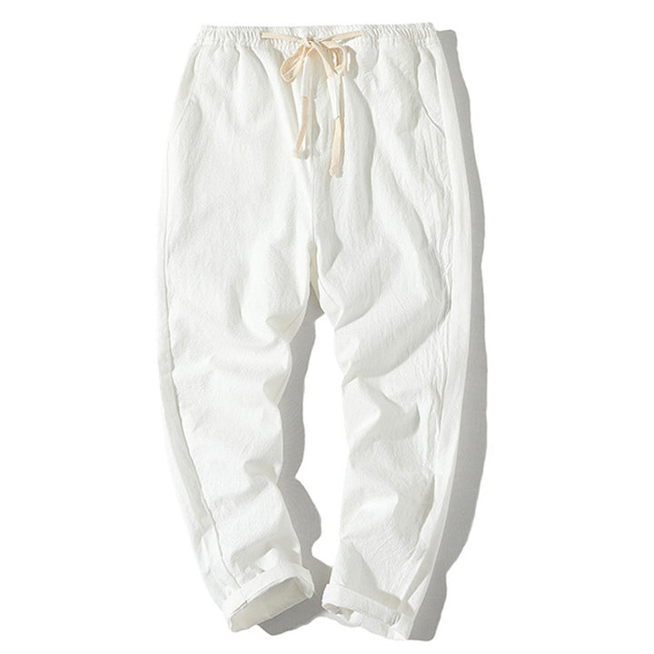Men's lightweight linen trousers with elastic waistband and drawstring, tapered fit and roll-up hem Mune Fashion