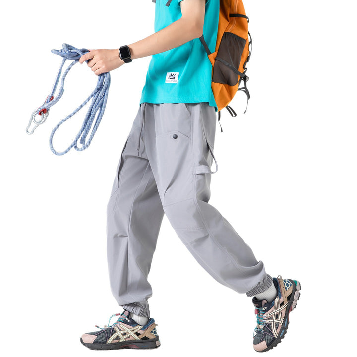 Men's utility cargo jogger pants with elastic waistband and oversized flap pockets