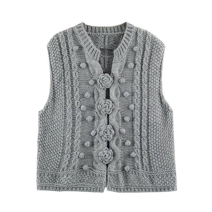 Women's knitted vest with cable pattern, flower appliqués and bobble texture Mune Fashion