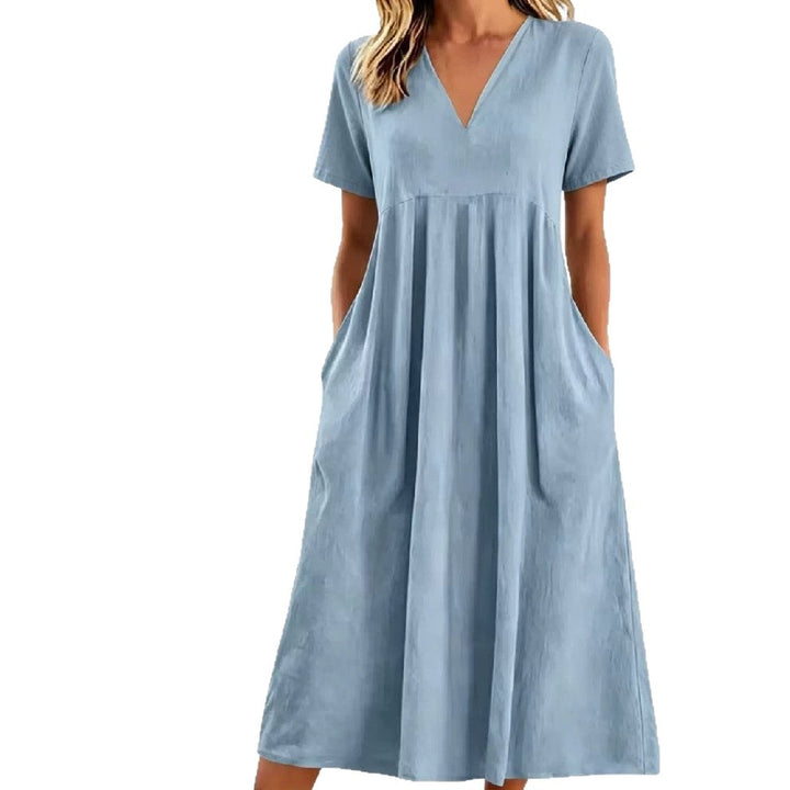 Women nan legeres V-neck midi dress with side pockets and gathered empire seam Mune Fashion