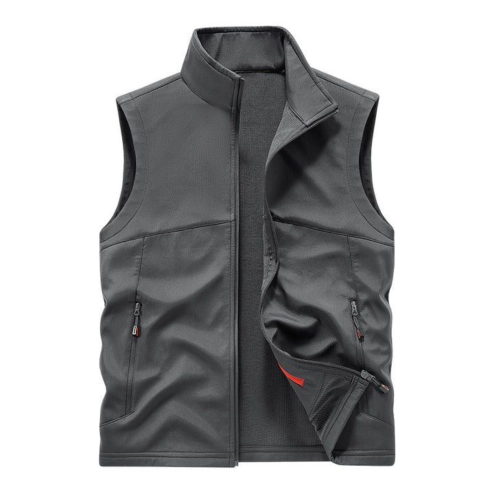 Men's breathable softshell outdoor vest with high closing stand-up collar and fleece-lined interior Mune Fashion