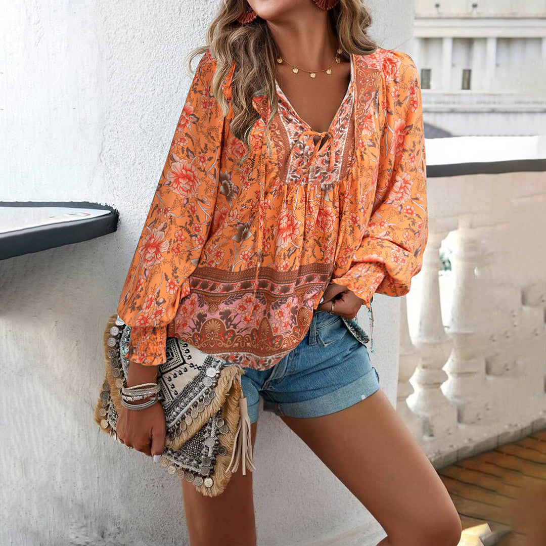 Women's loose Boho tunic with V-neck, tie belt, gathered sleeves, and floral pattern Mune Fashion