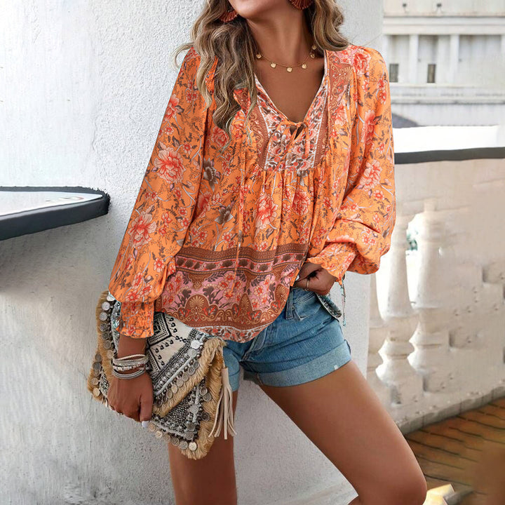 Women's loose Boho tunic with V-neck, tie belt, gathered sleeves, and floral pattern Mune Fashion