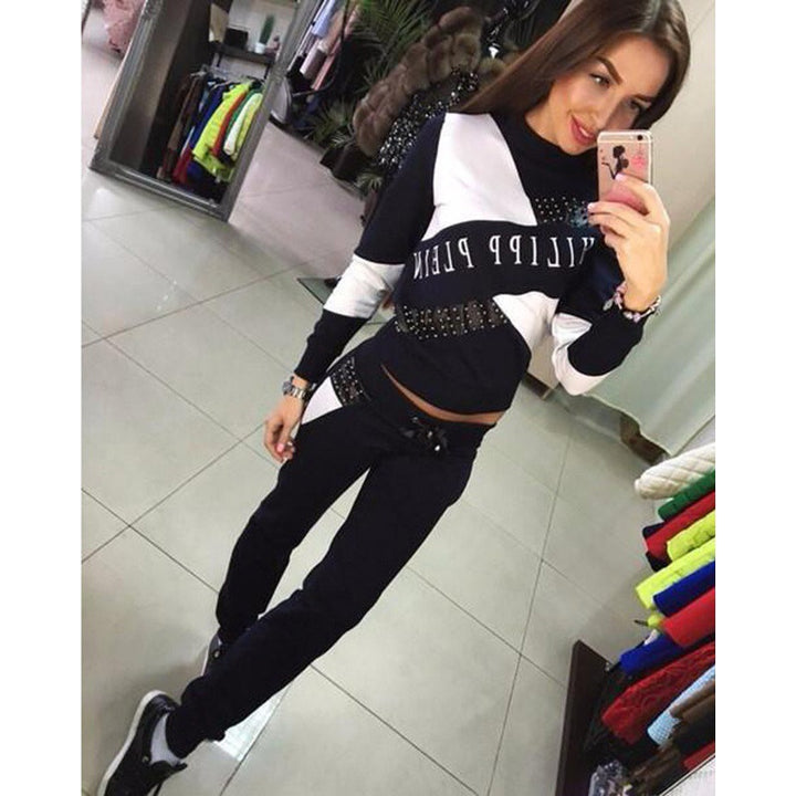 Women's sporty tracksuit set with studded detailing and color block design Mune Fashion