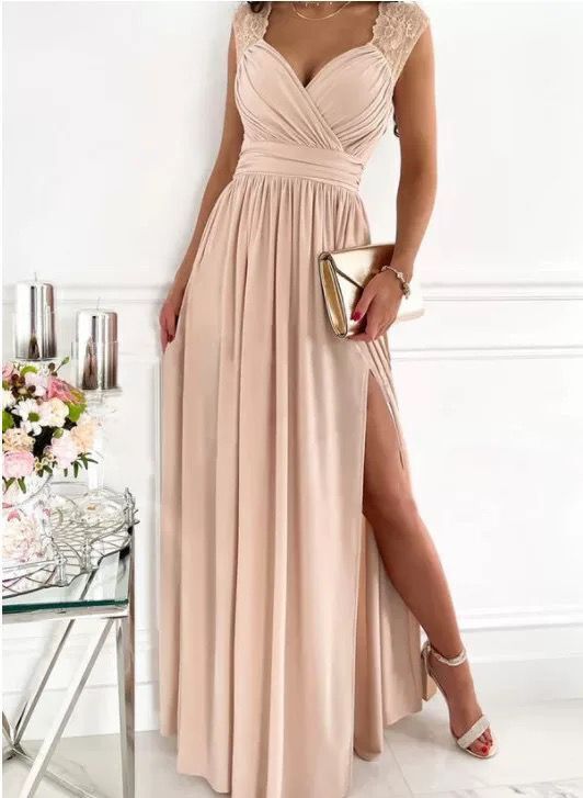 Ladies evening dress with elegant V-neck and ruffle details Mune Fashion