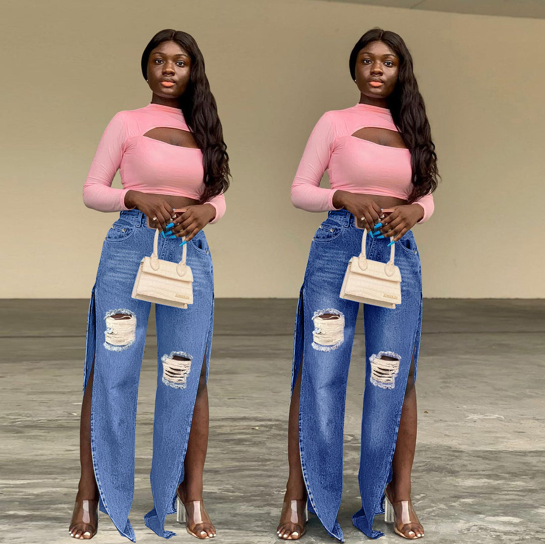 Ladies tapered denim jeans with high side slits and destroyed knee area Mune Fashion