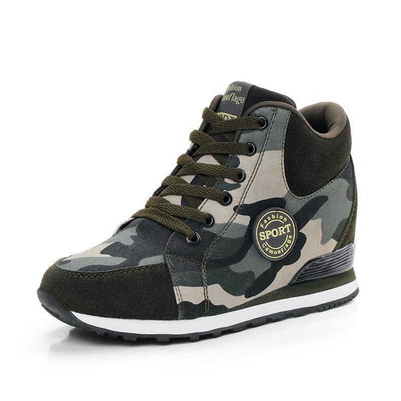 Women’s mid-high wedge running sneakers in a material mix with concealed inner wedge, padded ankle collar, and grippy tread sole Mune Fashion