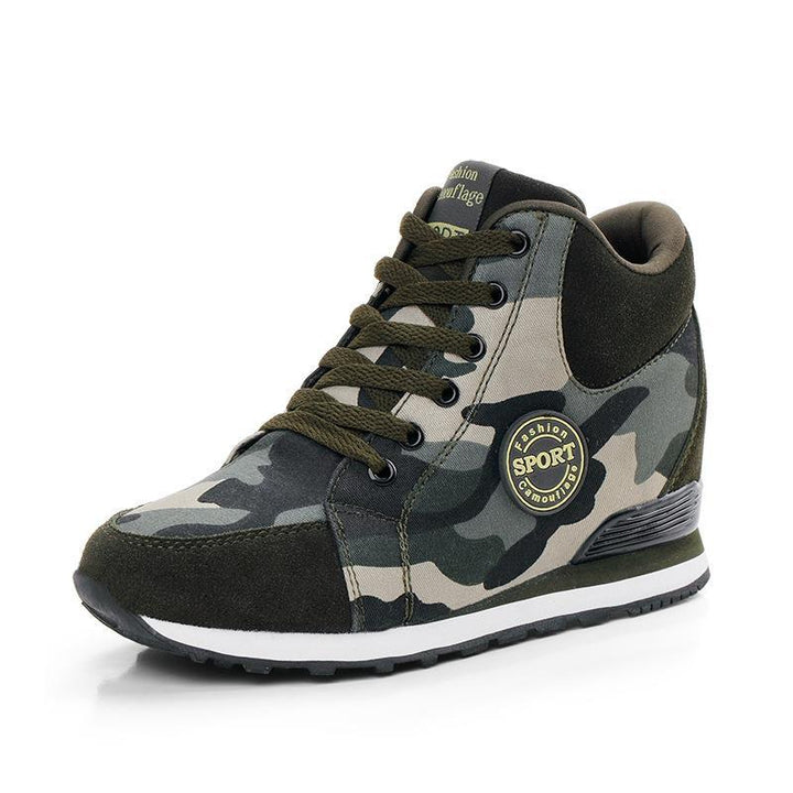 Women’s mid-high wedge running sneakers in a material mix with concealed inner wedge, padded ankle collar, and grippy tread sole Mune Fashion