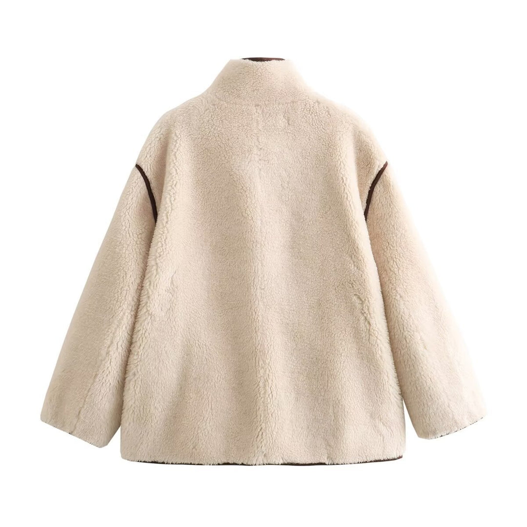 Women's short sheepskin look jacket with stand-up collar, concealed button placket and side pockets Mune Fashion
