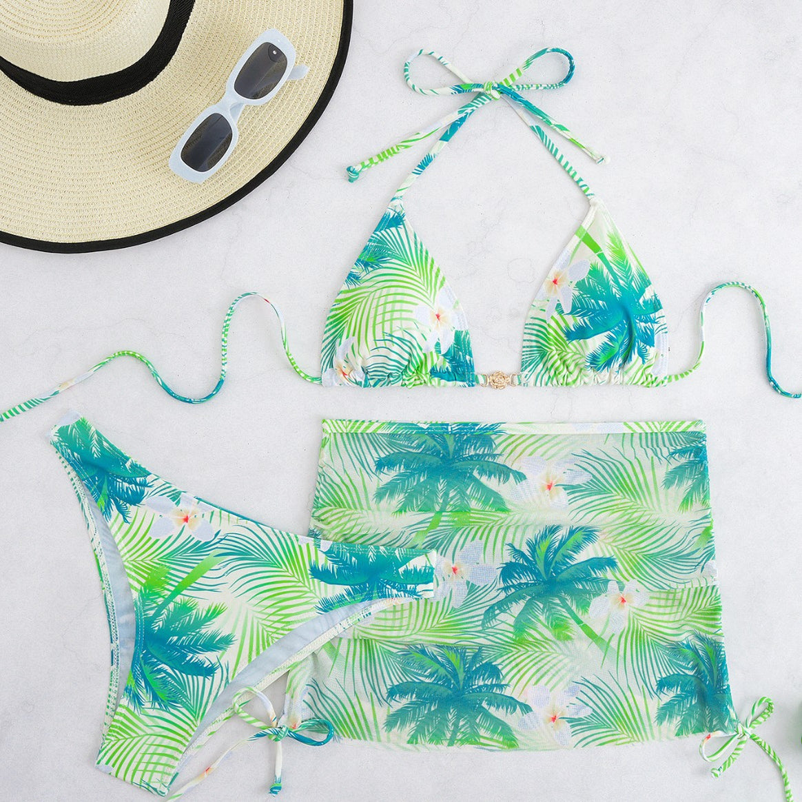 Ladies bikini set with elegant wrap skirt and tropical design Mune Fashion