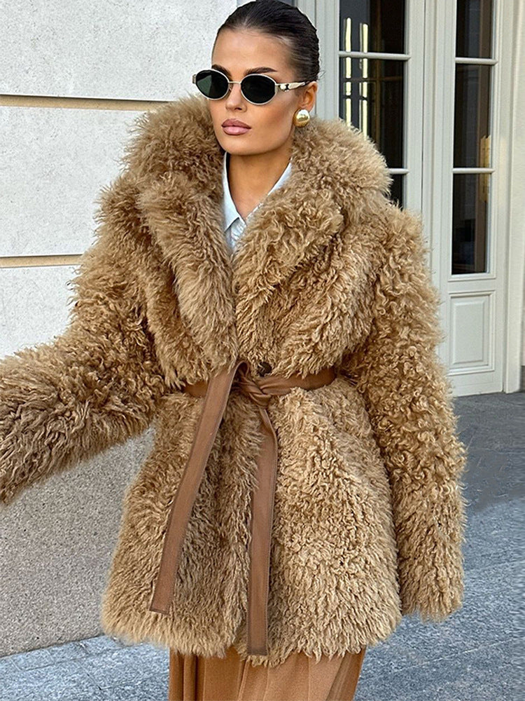 Women’s short coat made of voluminous bouclé faux fur with wrap and waist belt Mune Fashion