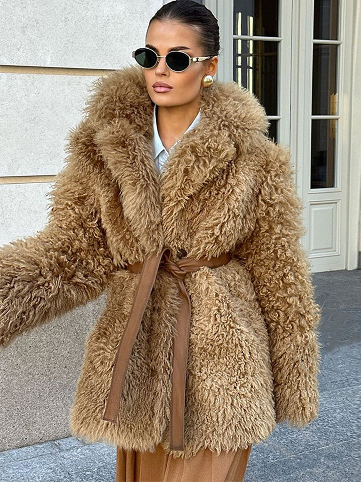 Women’s short coat made of voluminous bouclé faux fur with wrap and waist belt Mune Fashion