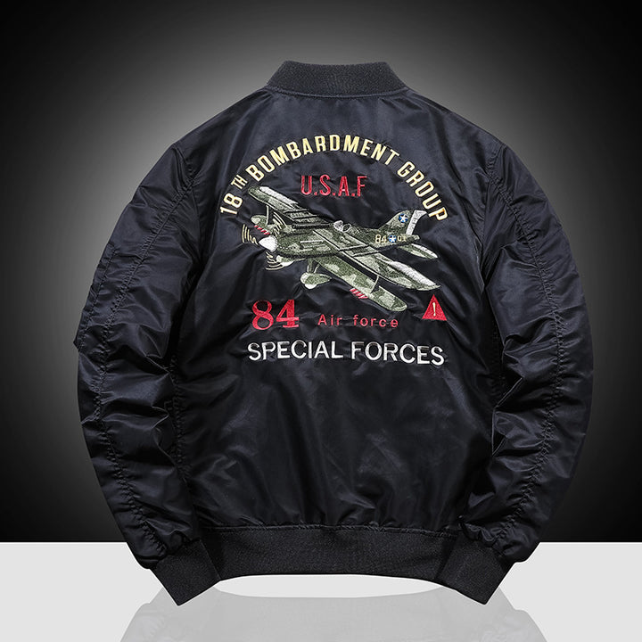 Men's bomber jacket in military patch style with sleeve utility pocket and ribbed collar Mune Fashion