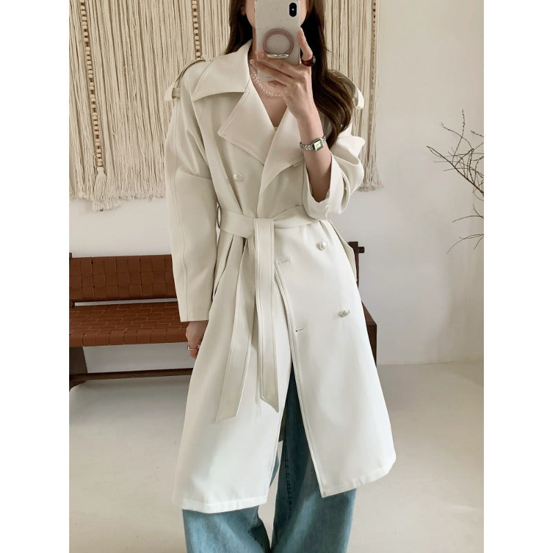 Ladies mid-length trench coat with oversized shoulders and mother-of-pearl buttons Mune Fashion