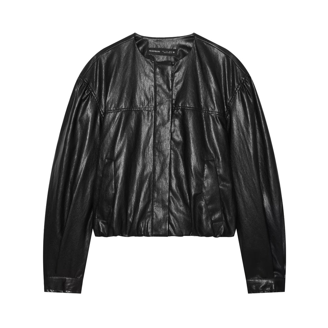 Women's short blouson in leather look with round neck, concealed snap button placket and balloon sleeves Mune Fashion