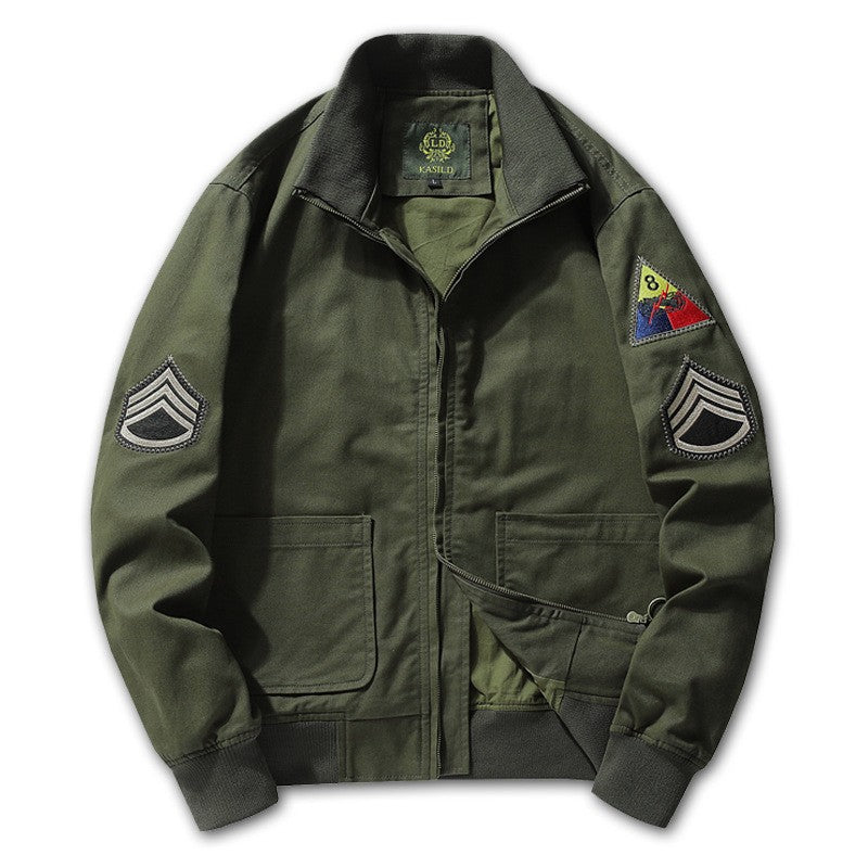 Men's military-inspired bomber jacket with applied patches, concealed zipper, and elastic cuffs.