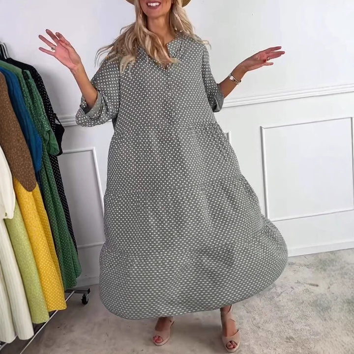 Women's lightweight flowing midi dress with polka dot pattern, tiered skirt and roll-up sleeves Mune Fashion