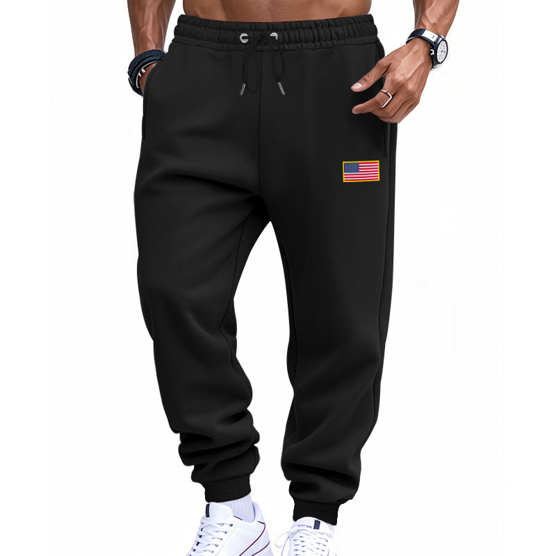 Men's trendy joggers with elastic drawstring waistband, ribbed cuffs, and discreet flag application Mune Fashion