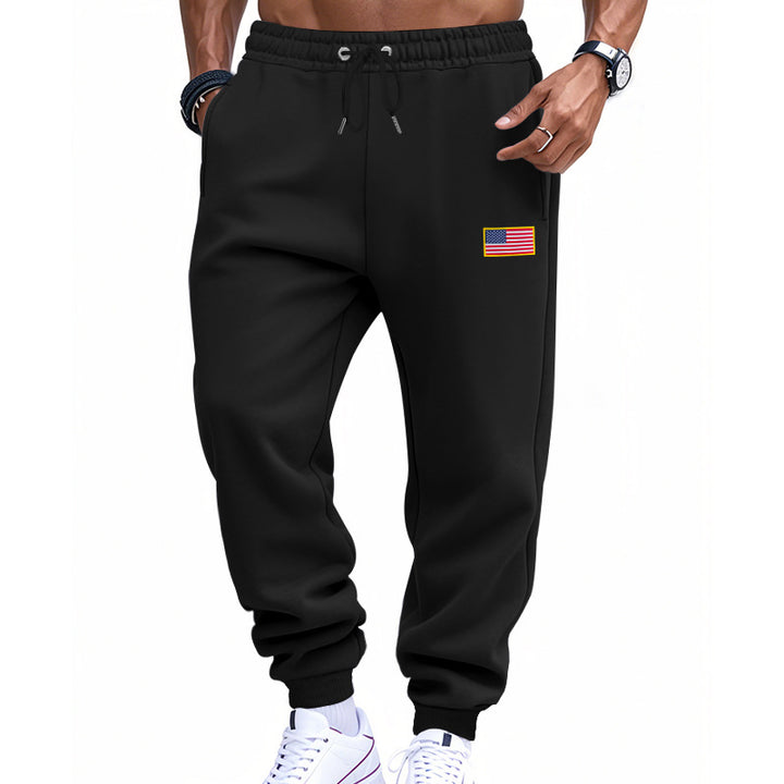 Men's trendy joggers with elastic drawstring waistband, ribbed cuffs, and discreet flag application Mune Fashion