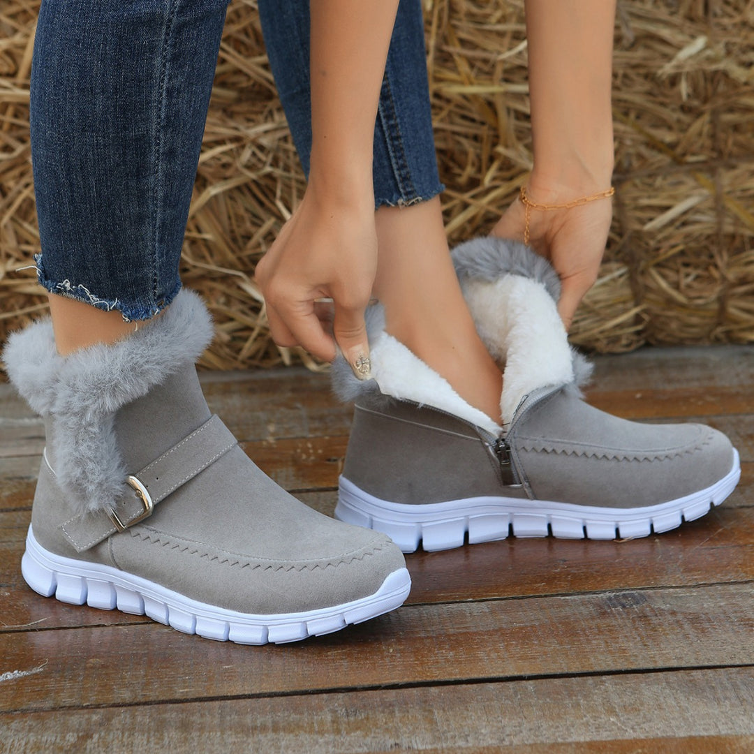 Women's non-fleece short boots with faux fur trim, suede leather look, side zipper, decorative metal buckle, and profiled lightweight sole Mune Fashion