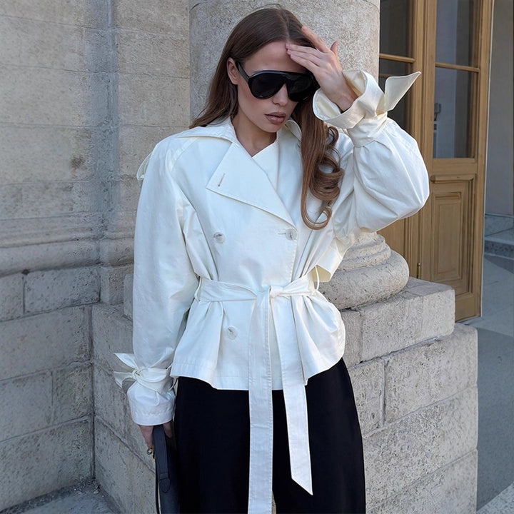 Women’s cropped double-breasted trench coat with waist belt, voluminous sleeves, and knot cuffs Mune Fashion