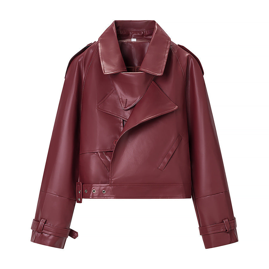 Women short cut biker jacket in leather look with asymmetrical lapel and waist belt Mune Fashion