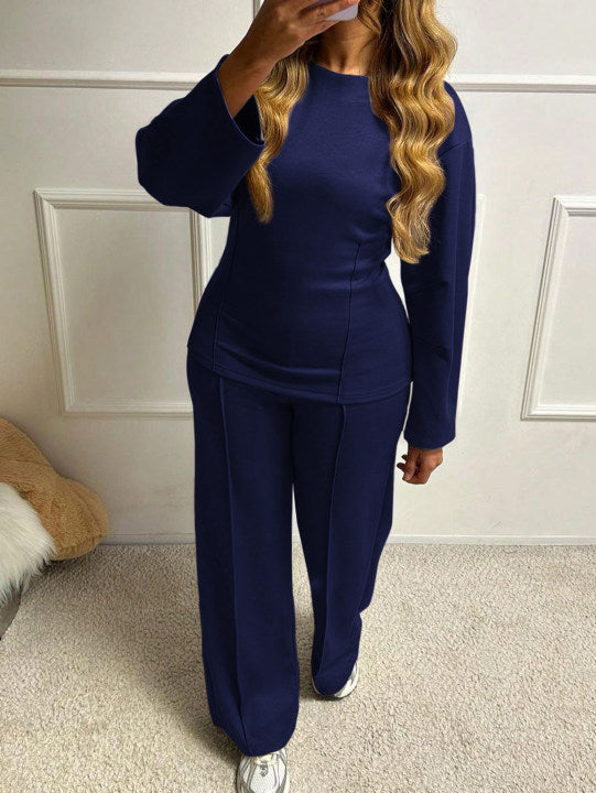 Women's soft lounge set with fitted sweatshirt, sculpting seam details, and wide palazzo pants leg Mune Fashion