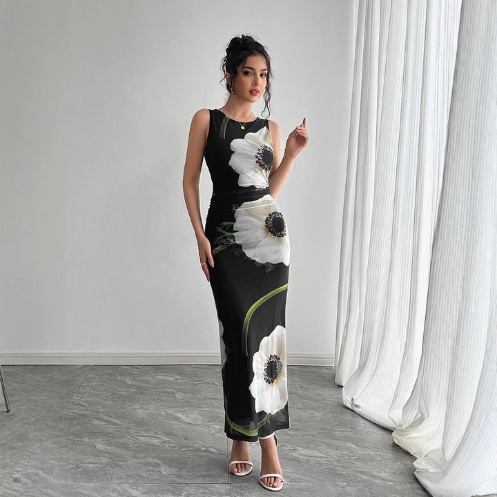 Women's form-fitting sleeveless maxi dress with photorealistic floral print and tailored silhouette Mune Fashion