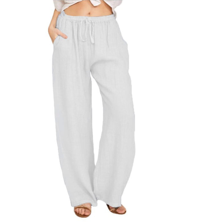 Women's airy palazzo pants with drawstring waistband, elastic waist finish, and side pockets Mune Fashion
