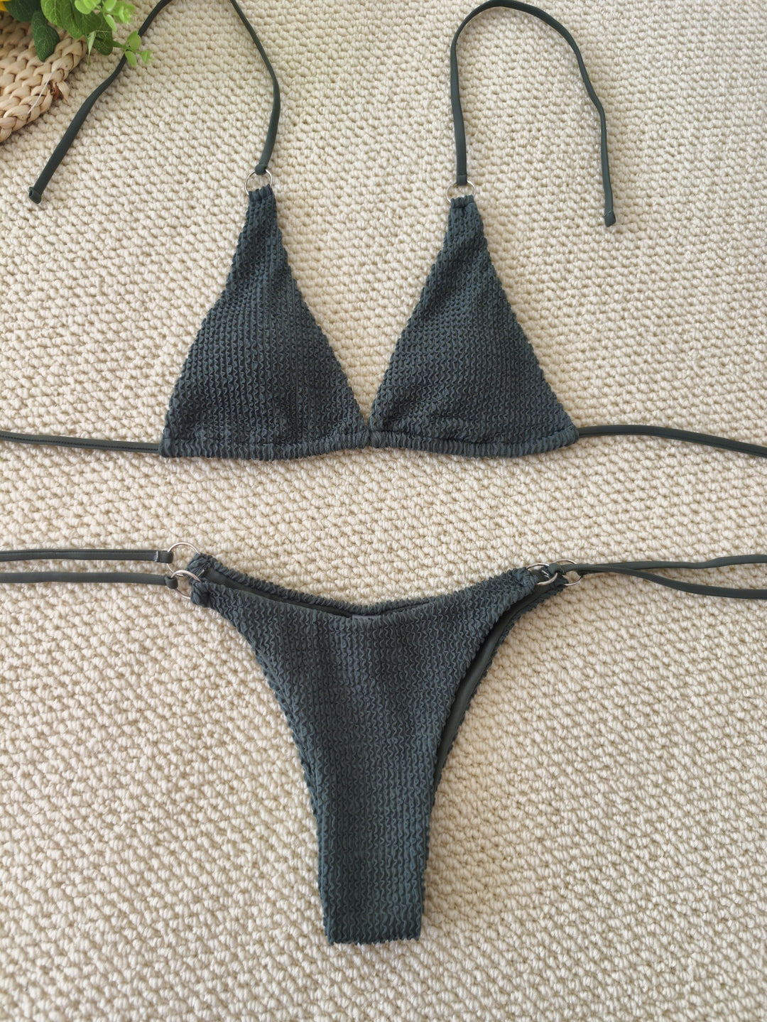 Women's triangle bikini with textured fabric and elegant ring embellishments Mune Fashion