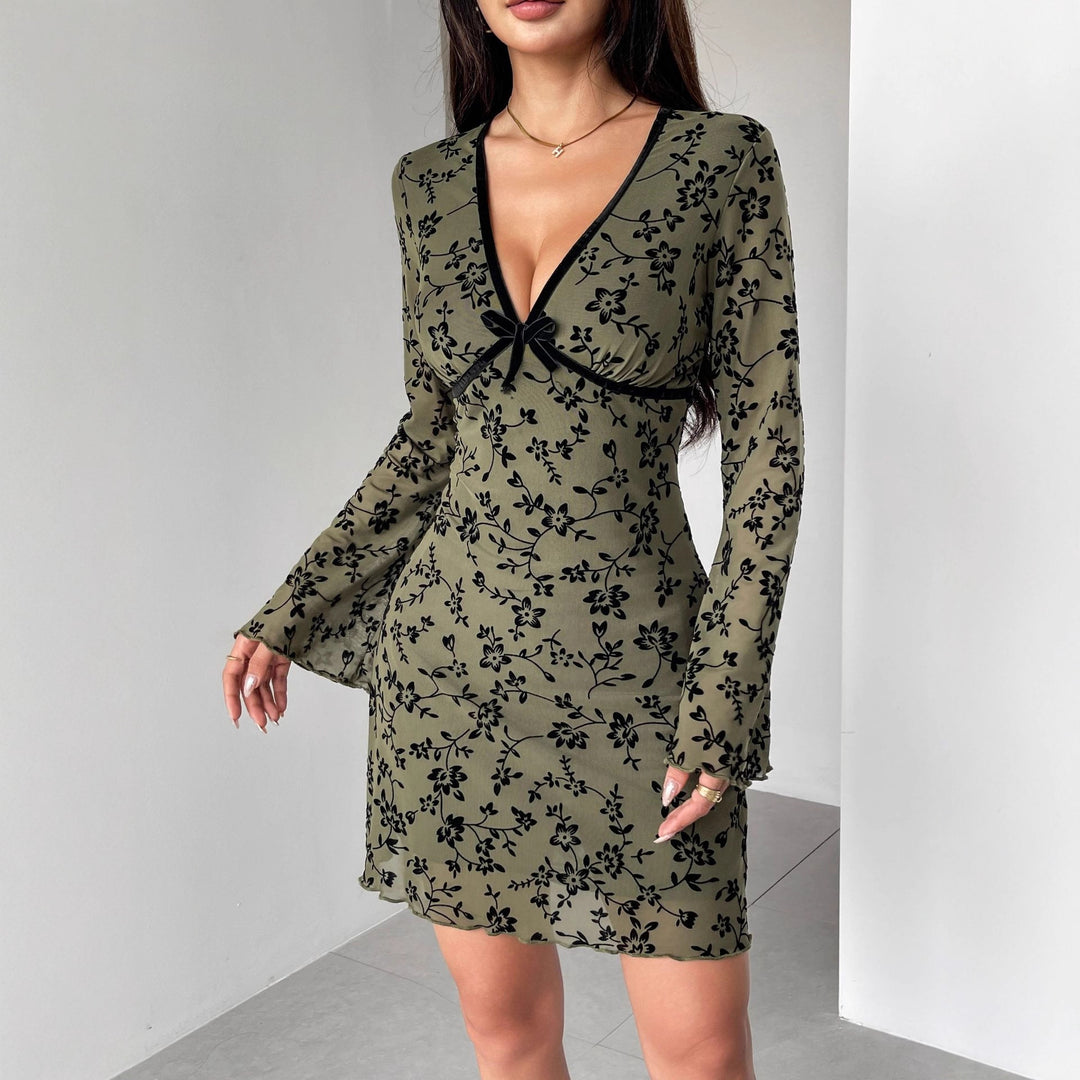 Women's fitted mesh mini dress with velvet flock floral pattern, deep V-neckline and bow appliqué Mune Fashion