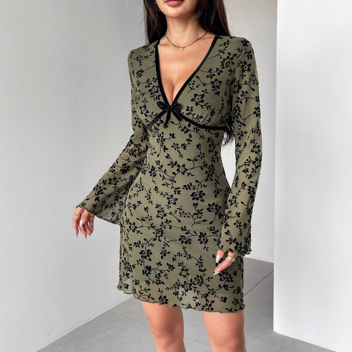 Women's fitted mesh mini dress with velvet flock floral pattern, deep V-neckline and bow appliqué Mune Fashion