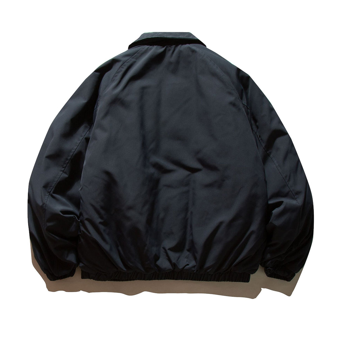 Men's short padded jacket with raglan sleeves, large flap pockets, and elastic hem Mune Fashion